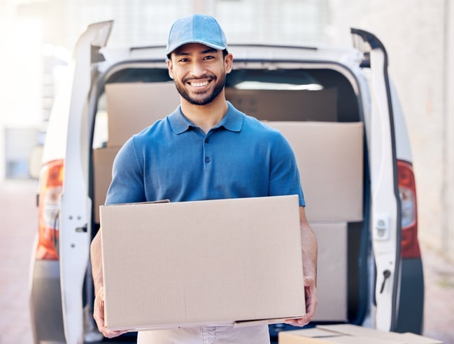 smiling-male-wholesale-distribution-delivery-person