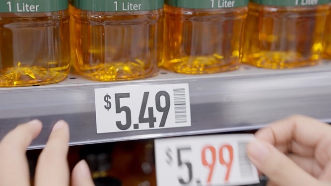 replacing one shelf price label with another