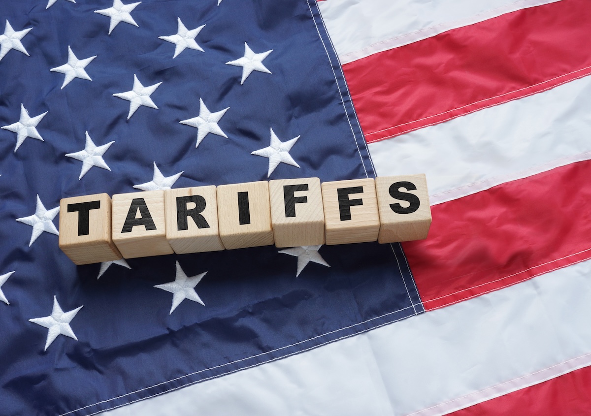 blocks spelling tariffs on american flag