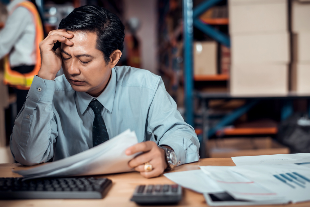 manager frustrated with manual order processing
